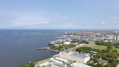 an aerial view of a city and a body of water at MANILA BAY EXECUTIVE SUITE pearl of orient in Manila
