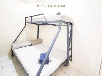 a bunk bed in a room with the words pay room at Cenco Suites Residences - Transient in Tanza Cavite in Tanza