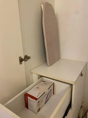 a box sitting on a shelf in a room at Spacious condo in Venice Luxury Residences in Manila