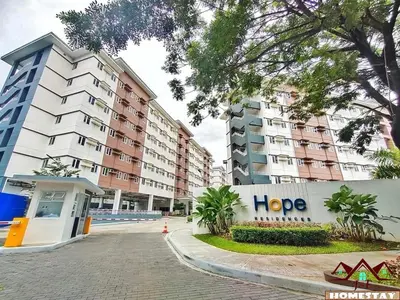 a row of apartment buildings in a city at J & F Homestay - Cavite, Philippines in Trece Martires
