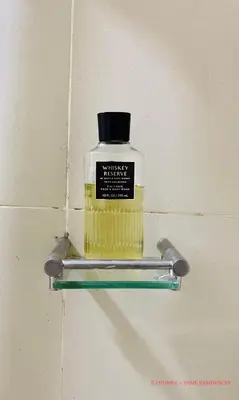 a bottle of mustard hanging on a wall at EJ Homes - Fame Residences in Manila
