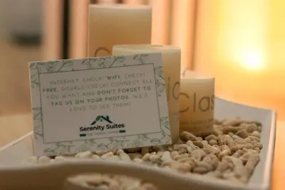a sign sitting on a pile of peanuts with candles at Serenity Suites: Your tranquil gateway! in Biñan