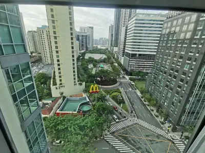 a view from a window of a city at Caleze Properties AVANT at the Fort BGC Studio in Manila