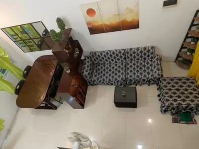 an overhead view of a living room with furniture at Misty Hills Guesthouse Amadeo - Tagaytay in Amadeo