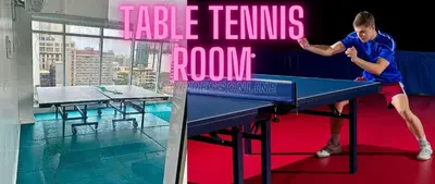 a man standing on a ping pong table next to a swimming pool at Family Room Affordable, Cheapest Deluxe Double Unit in Manila with 2 Balconies & 2 Bathrooms 25 Percent Discount, Free Sauna & Pool Access Near Manila Bay, Robinsons Place Ermita, Pgh, Bellagio, UP, Pedrogil, US Embassy, NAIA Airport Updated 2024 in Manila