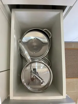 a silver kitchen utensils in a white box at nJoy! BOHO Luxury at Venice Grand Canal in Manila