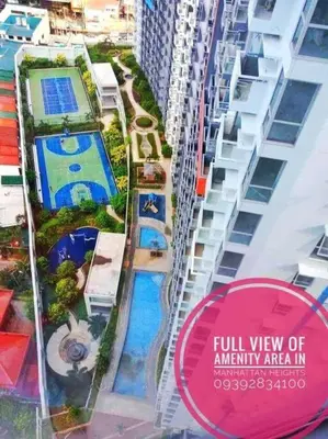 a view of an apartment building with a sign at Cubao Manhattan, U 8J T D,Studio in Manila