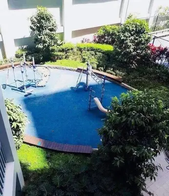 an empty pool with a playground in a building at Cubao Manhattan, U 8J T D,Studio in Manila