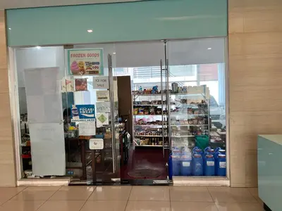 a store front of a store with a refrigerator at Staycation Condotel Room To Stay in Manila