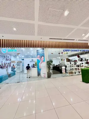 a store with a person standing in the middle of a room at 9th Queen Size One Bedroom in Grace Residences, Taguig in Manila